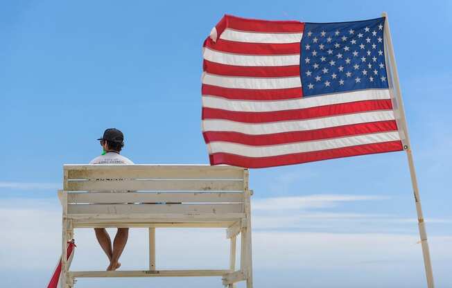 Chair And USA Flag at Pier Village Apartments, Long Branch, New Jersey