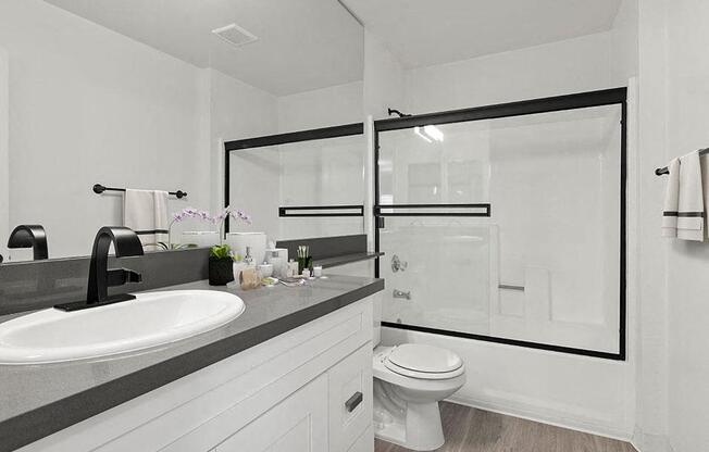 Modern styled bathroom with shower and tub.