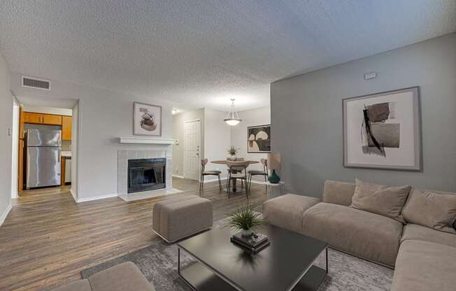 A living room with a fireplace and a couch.