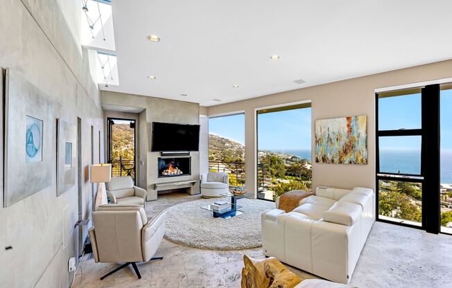 Contemporary Modern Masterpiece with Rooftop Deck and White Water Ocean Views in Laguna Beach
