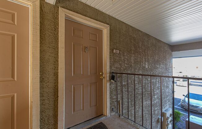 2nd floor unit in upscale guard gated SW complex near Strip