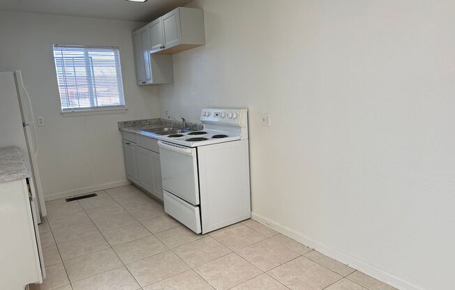 Remodeled 2 Bedroom Duplex with  fenced backyard