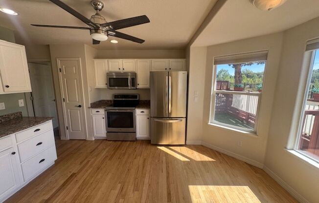 Spacious 3-Bedroom, 3-Bath Home with Open-Space Views & Attached Garage