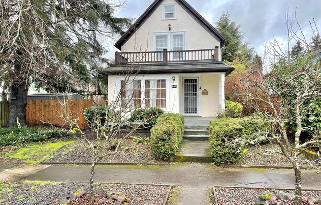 North Tabor Charmer with Sprawling Backyard, Detached Garage, Hardwoods, Lots of Upgrades