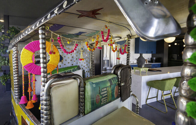 a bench booth inside a three wheel motorcycle at Lotus Republic Apartments for rent in Downtown Salt Lake City, Utah