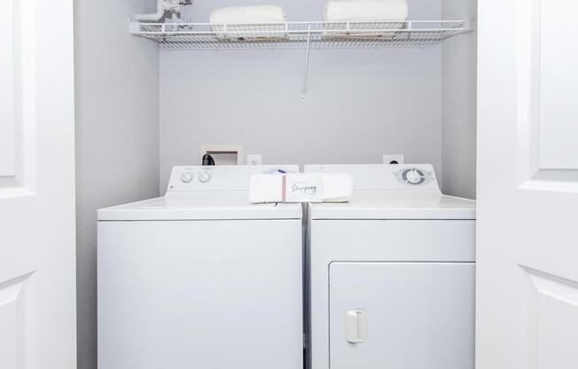 a kitchen with a sink and a refrigerator