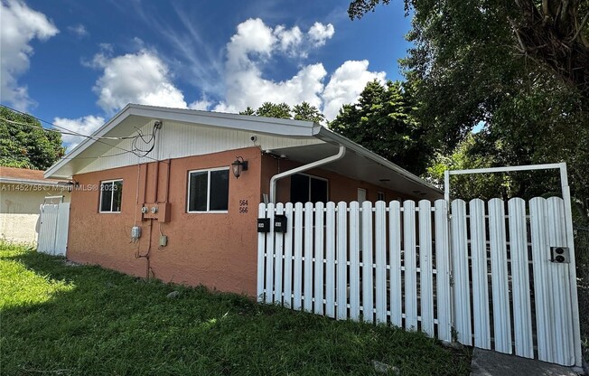 566 NW 95 ST