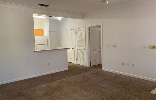 1/1 Ground Floor Unit with attached Garage!  Mirabella Condominiums