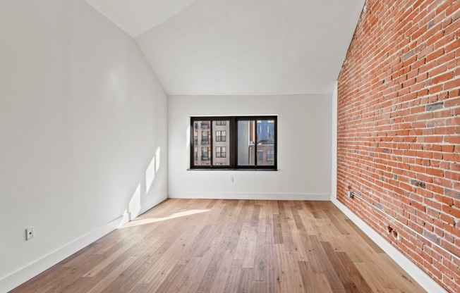 Experience the elegance of this spacious loft with stunning city views.