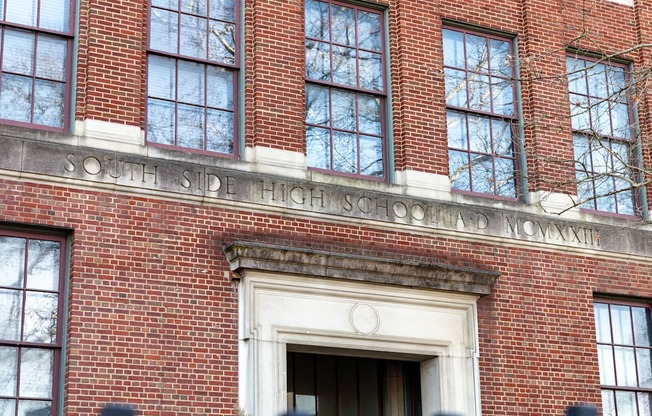 a brick building with the words south side high school in front of it at Residences at South High, Pittsburgh ? 