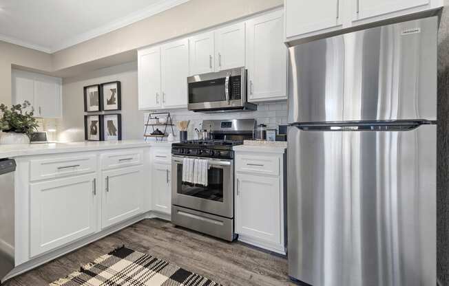 Estancia at Mission Grove Apartments Kitchen with Stainless Steel Appliances