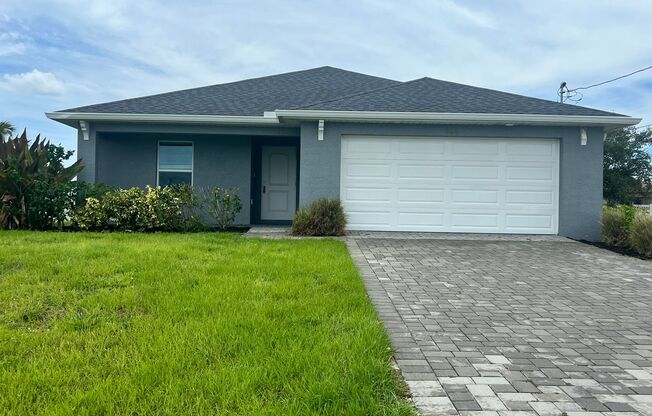 "Charming Cape Coral 3BR/2BA Home with 2-Car Garage and Screened Lanai – Move-In Ready!"