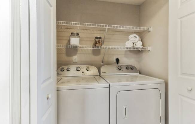 the laundry room is equipped with a washer and dryer