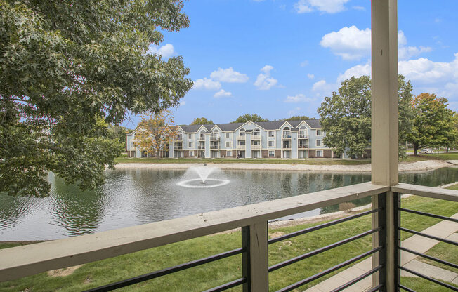 private balcony with a pond view at North Pointe Apartments in Elkhart, IN