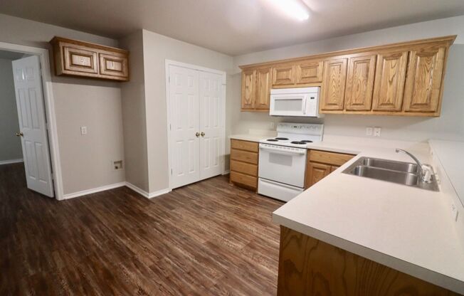 FOR LEASE! Nicely Remodeled 3 BR - 2 BA Brick Duplex With a 2 Car Garage in Weatherford.