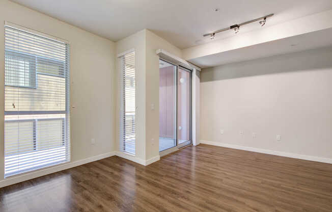 Studio Living Room with Balcony and Hard Surface Flooring