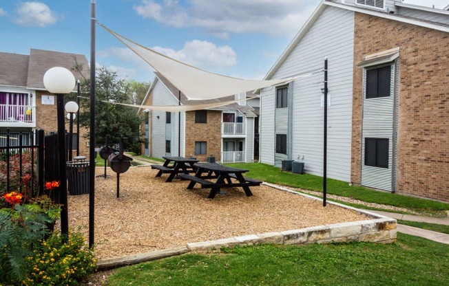 our apartments are equipped with a picnic table and a grill