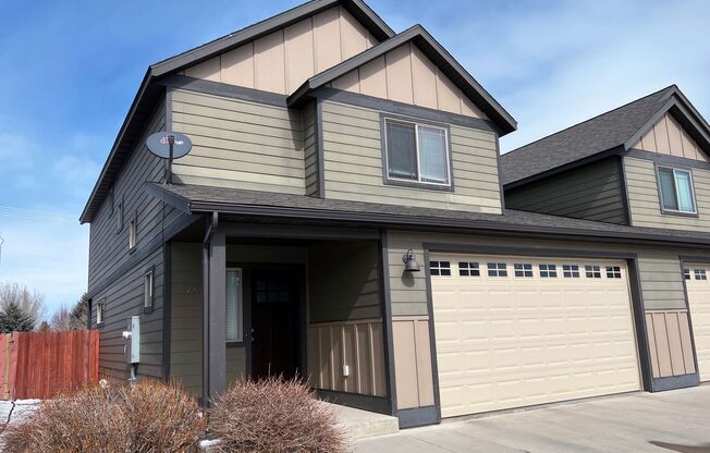 3-Bedroom Townhome with Double Garage & Private Fenced Yard