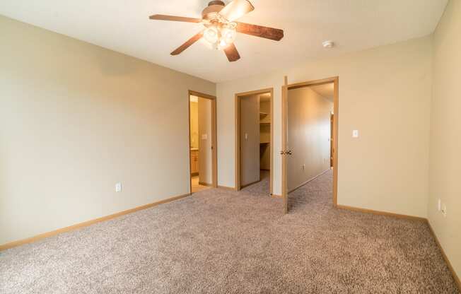 large carpeted bedroom in original style