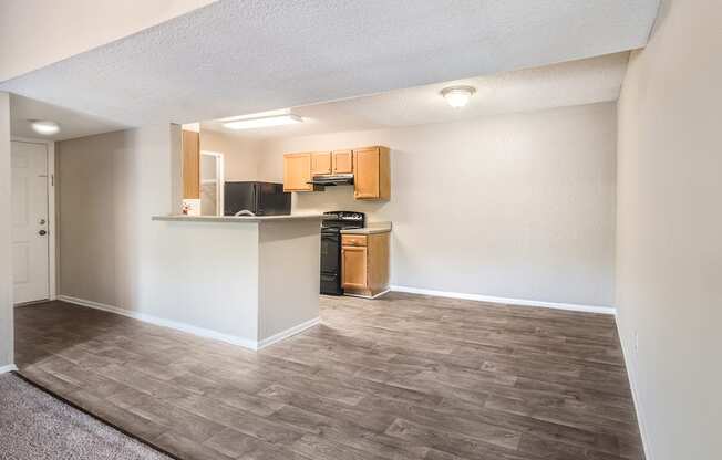 Model Kitchen and Dining Room at Reflections Apartment Homes in Gainesville, Florida, FL