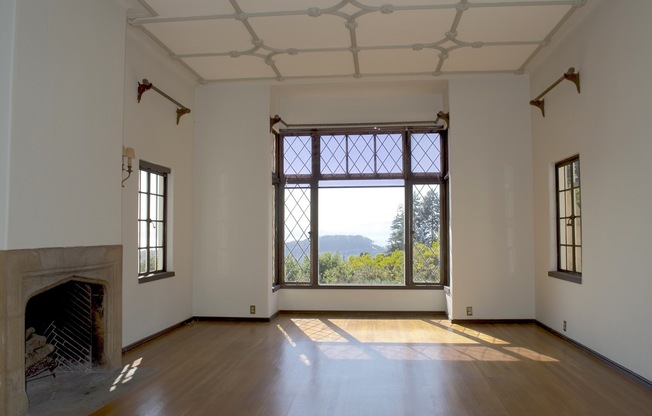 Fantastic Views with vine covered grand Tudor style home with slate roof.