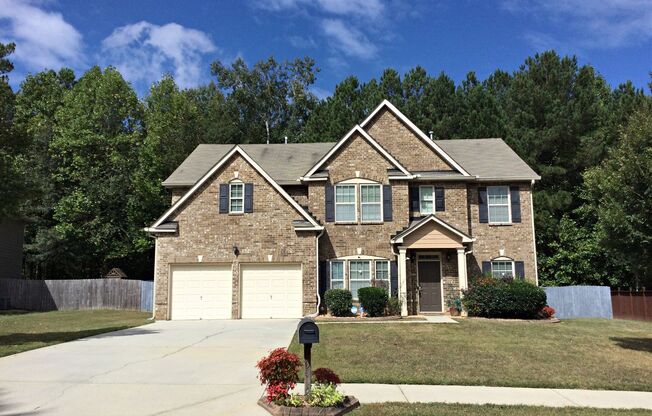 The perfect blend of Classic charm and modern convenience in this 5 Bedroom Craftsman