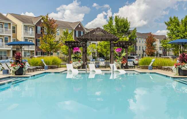 our apartments offer a swimming pool with a gazebo and umbrellas