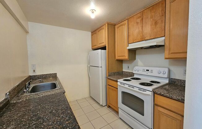 Sunny 2 Bed / 1 Bath Condo with Private Balcony (2nd Floor)
