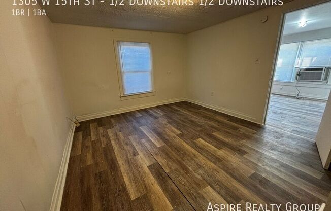 1305 W 15 ST