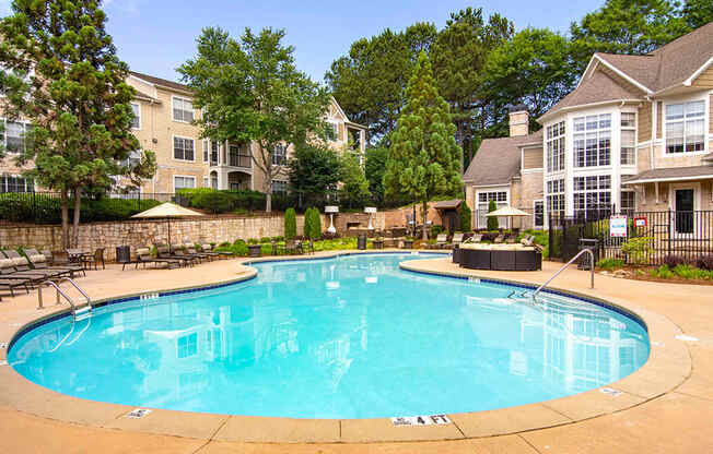 Apartments for Rent in Alpharetta GA - The Ascent at Windward Apartments Swimming Pool With Lounge Chairs and Shaded Seating