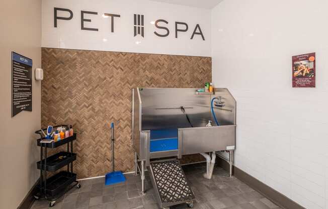 a spa with a sink and a bath tub in a room with a sign above