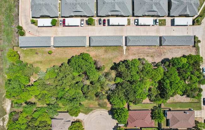 A residential area with houses and trees.