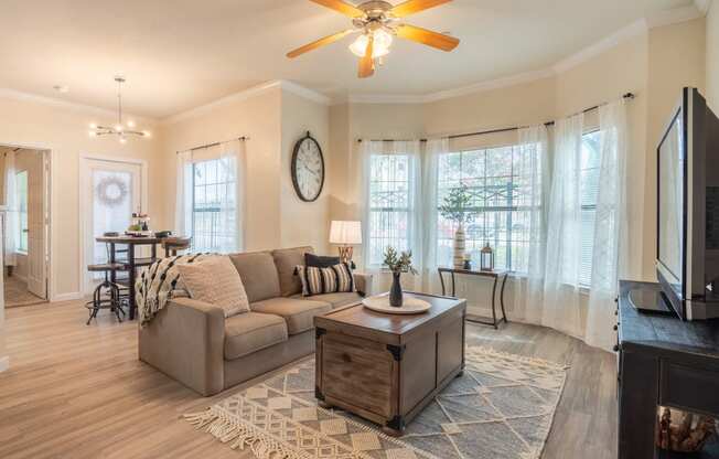 a living room with a couch and coffee table