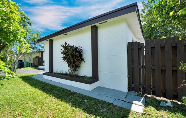 Sunrise Gem: Updated 2-Bed, 2-Bath with Garage Parking