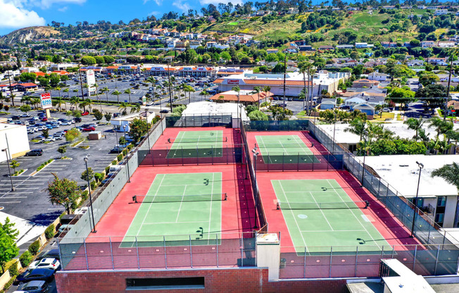 a view of the tennis courts on the roof of a building at Willow Tree Apartments, California, 90505