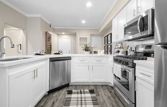 Estancia at Mission Grove Apartments Kitchen with Stainless Steel Appliances