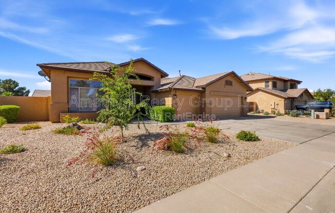 7017 W GREENBRIAR DR