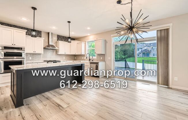 Executive Andover House Available Now, Open Floor Plan, Lower Family Room, 4 Car Garage, Fenced Yard!