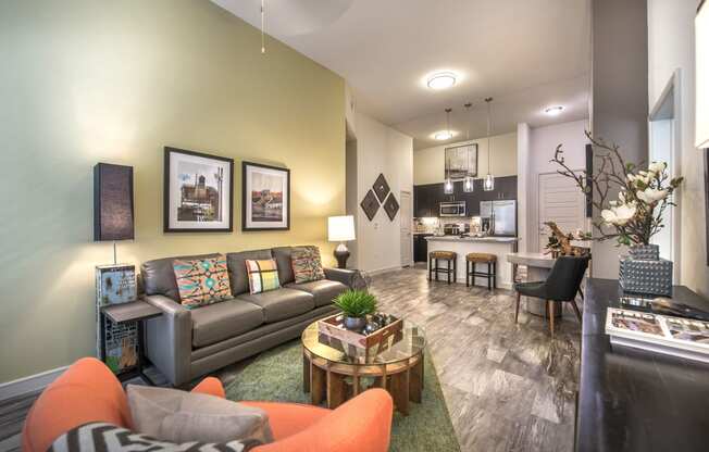 a living room with a couch and a table at South Side Flats, Dallas, TX, 75215