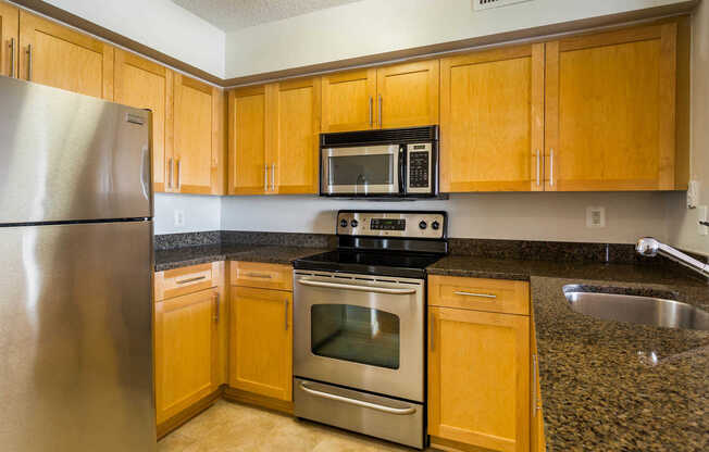 Kitchen with Granite Countertops and Stainless Steel Appliances