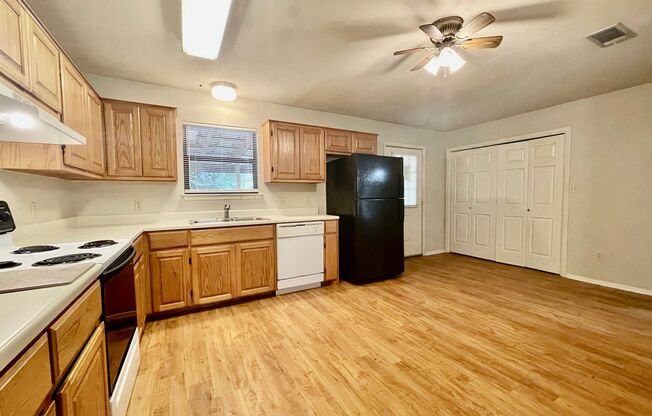 Eclectic 3 Bedroom, 2 Bathroom Home - 2 Car Garage - Fenced Yard and More!