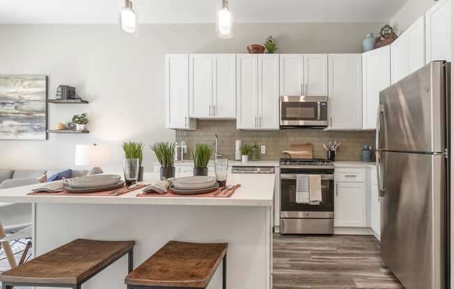 The Airdrie at Paoli Station breakfast bar and white cabinets