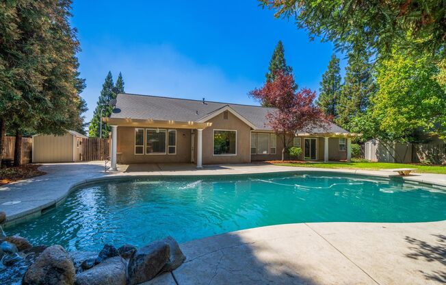 4-bedroom, 3-bathroom home located in great neighborhood with pool!