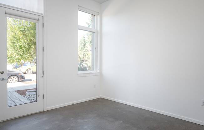 The Lenox | Living Room Area with Large Windows