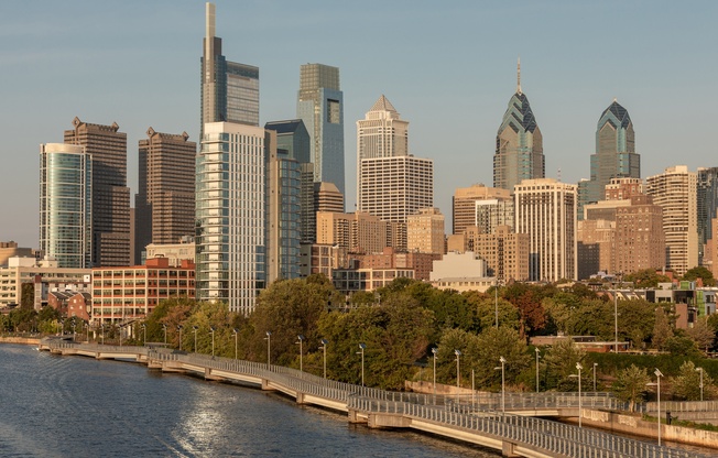 A city skyline with a river running through it.