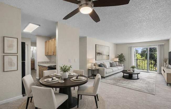 A modern dining room with a round table and chairs.