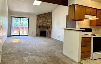 Spacious and Bright Top-Floor Apartment with Skylights, Fireplace, and Balcony in Sought-After Location