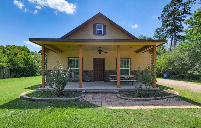 THIS IS A  NEW BEAUTIFUL UPDATED COUNTRY STYLE 3 BEDROOM 2 BATH HOME WITH OVER 1 ACREA OF LAND IN CONROE, TEXAS