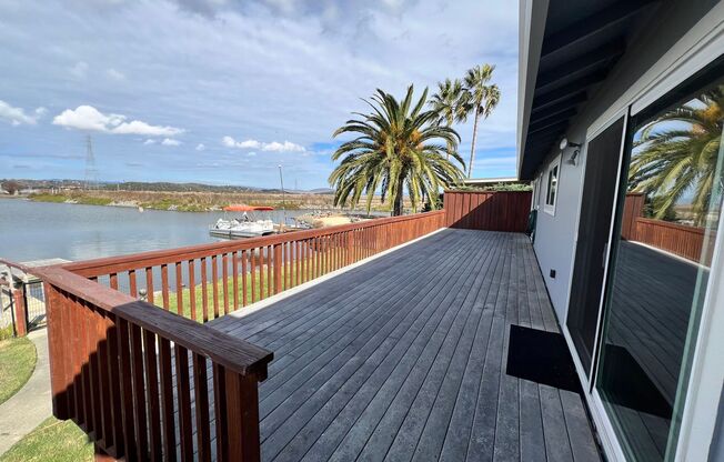 WATERFRONT HOME IN BEL MARIN KEYS WITH BOAT DOCK, FENCED YARD.