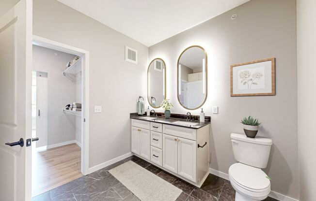 a bathroom with a toilet and a sink